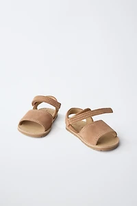 SANDALES EN CUIR PIEDS NUS
