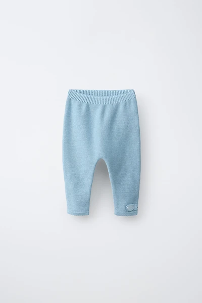 PANTALON EN MAILLE AVEC DÉCOR POISSON
