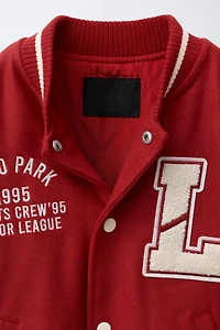 BLOUSON BOMBER EN DRAP DE LAINE ET MANCHES À AVEC PIÈCES