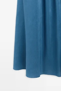 Robe longue fluide à bretelles croisées