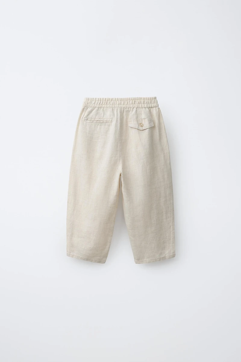 PANTALON À PINCES 100% LIN