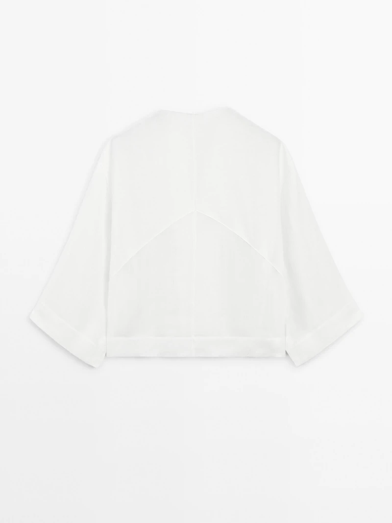 Flowing linen blend blouse with seam details