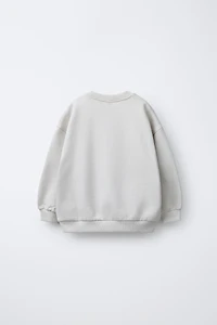 SWEAT IMPRIMÉ NIRVANA ® IRISÉ