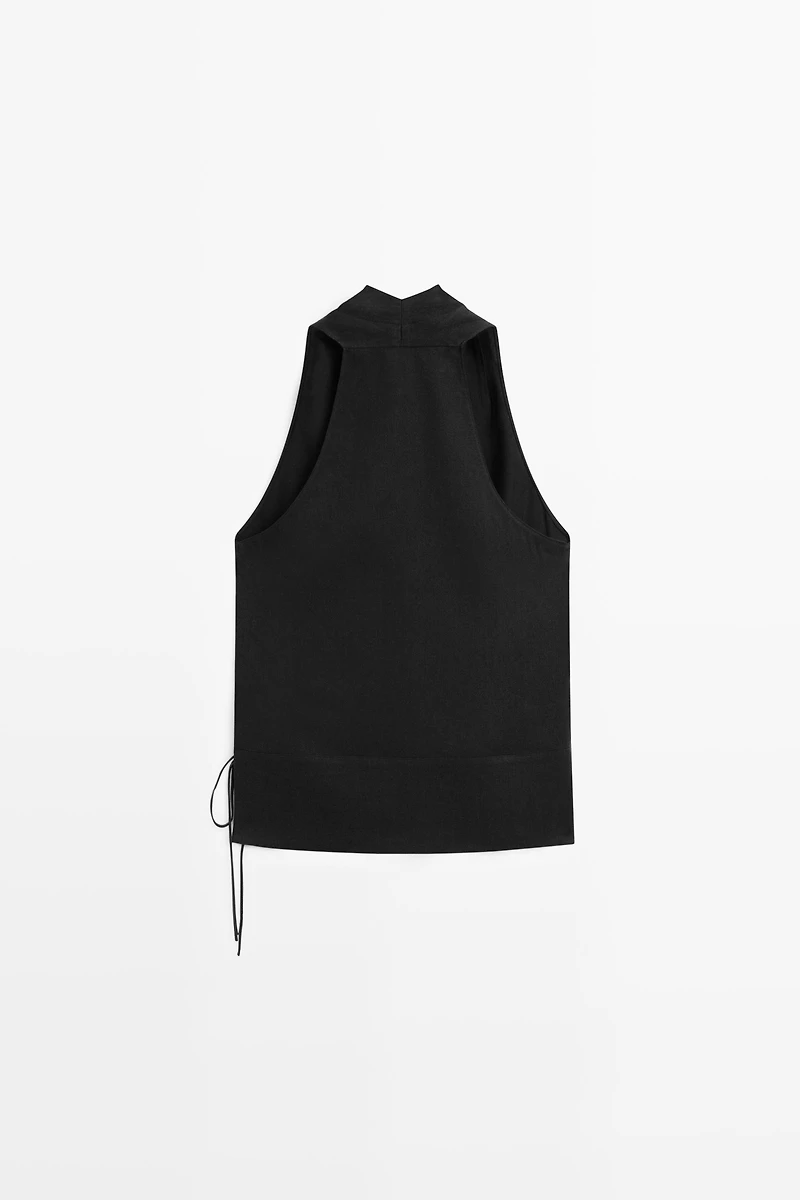 Top drapé croisé avec détail de ceinture