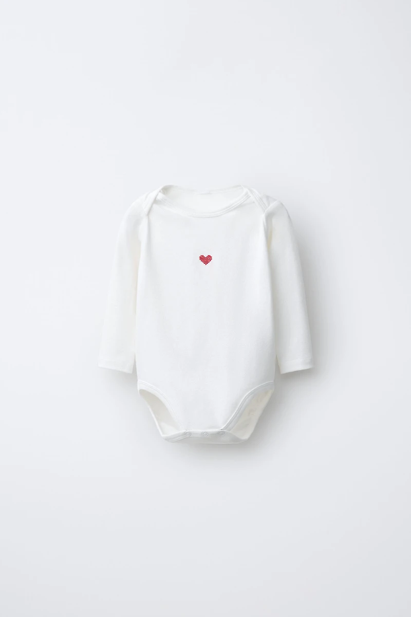 THREE-PACK OF HEART BODYSUITS