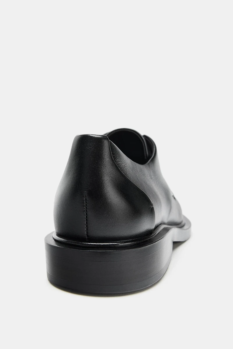 DERBYS EN CUIR À LACETS