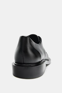 DERBYS EN CUIR À LACETS