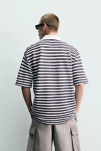 POLO JACQUARD À RAYURES BRODÉ