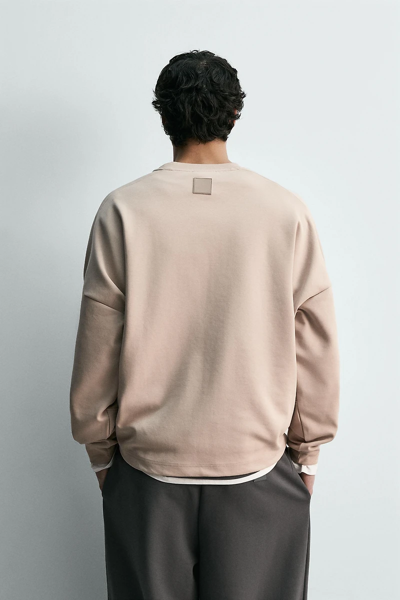 INTERLOCK POCKET SWEATSHIRT