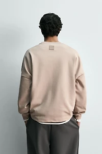 INTERLOCK POCKET SWEATSHIRT