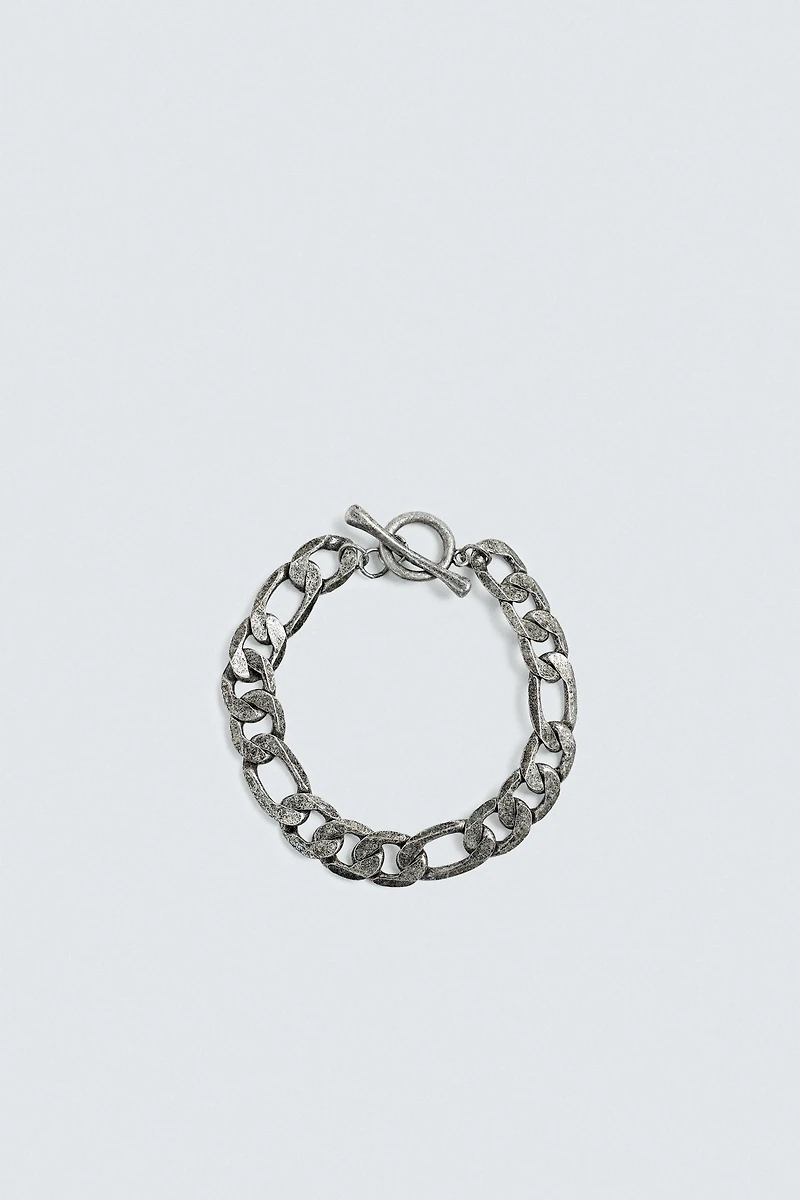 BRACELET À MAILLONS MÉTALLIQUES