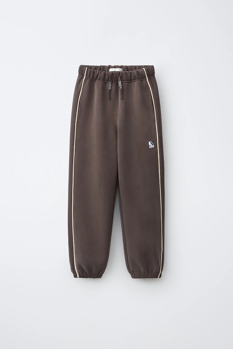 SPORTY CONTRAST PIPING TROUSERS