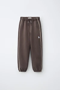 SPORTY CONTRAST PIPING TROUSERS