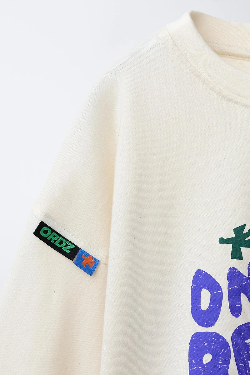 PRINTED LABEL T-SHIRT