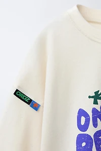 PRINTED LABEL T-SHIRT