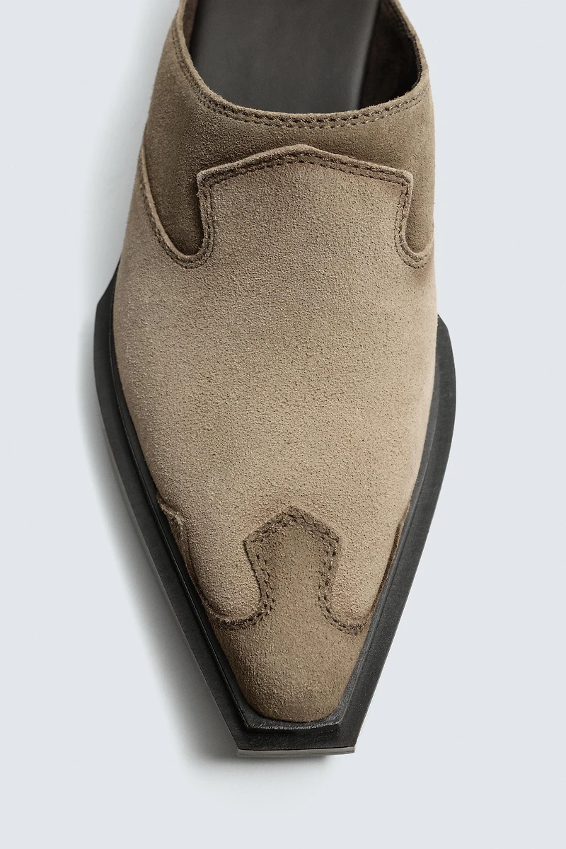 SABOTS EN CUIR