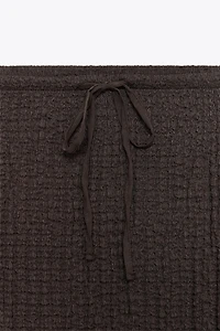 TEXTURED MIDI SKIRT