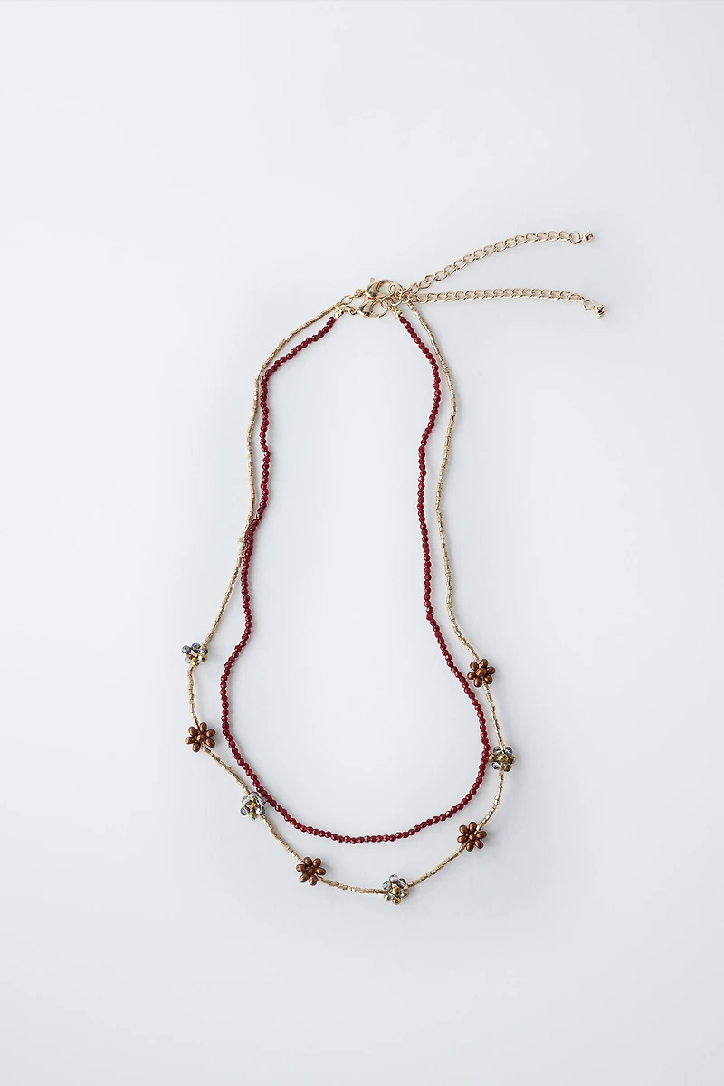 TWO-PACK OF BEADED FLOWER NECKLACES