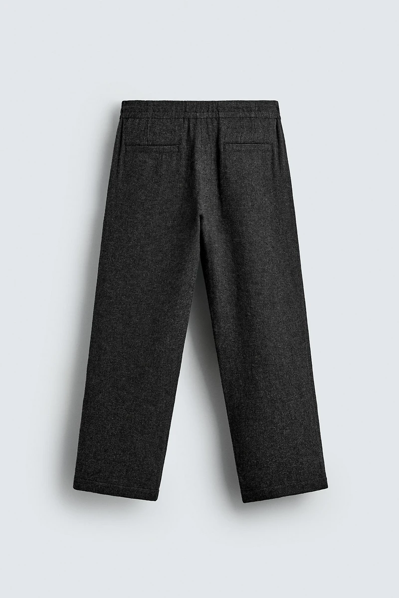 PLEATED WOOL PANTS