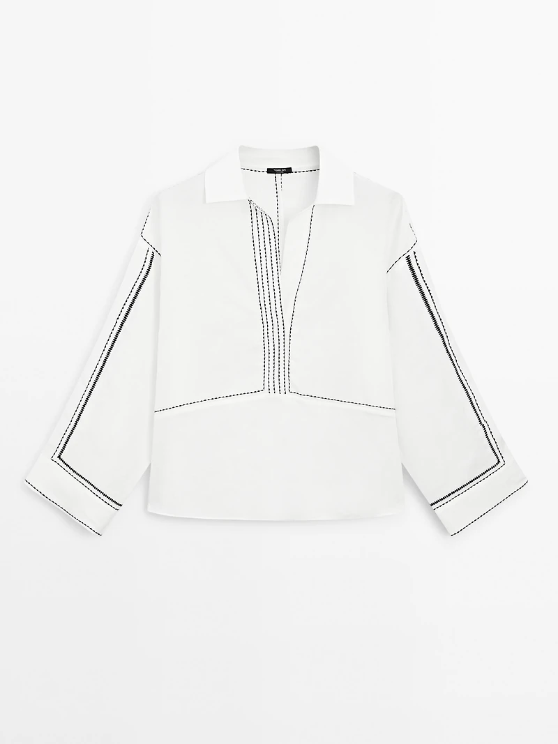 Loose-fitting blouse with contrast details