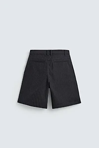 PINSTRIPED PLEATED SHORTS
