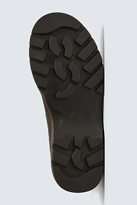 BOTTES EN CUIR À SEMELLES ÉPAISSES