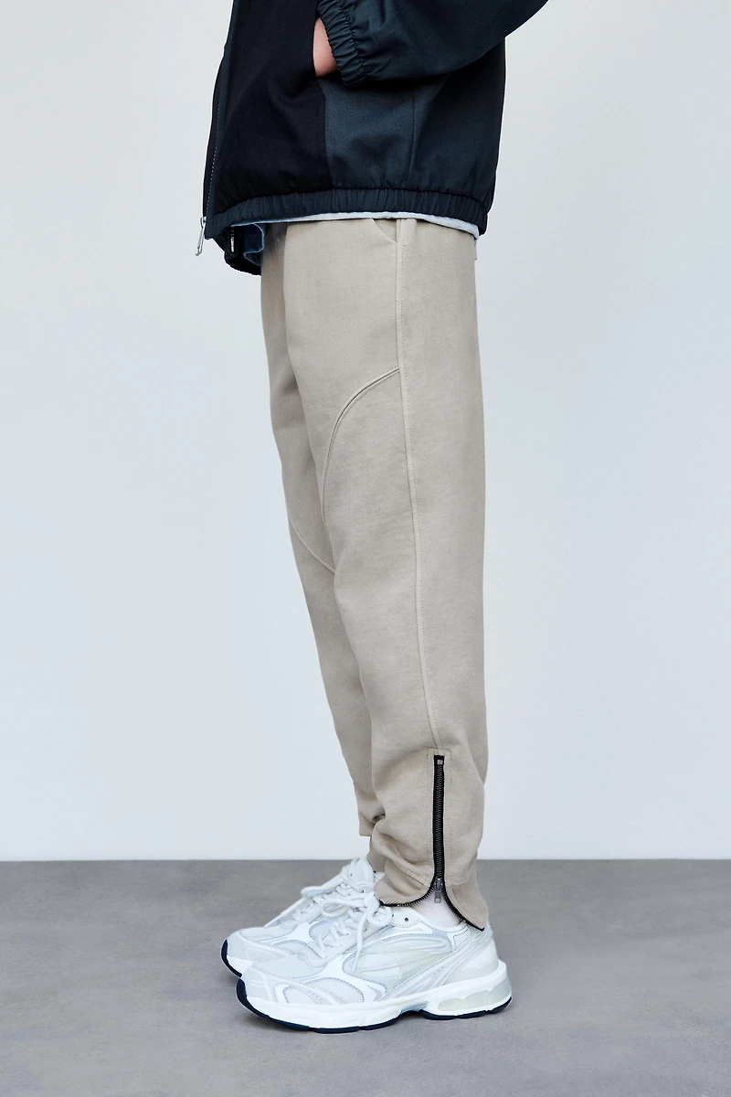 PANTALON JOGGER ZIPPÉ