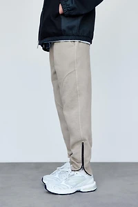 PANTALON JOGGER ZIPPÉ