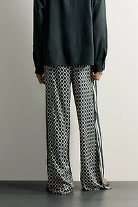 LIMITED EDITION FLOWY PANTS WITH SIDE BANDS