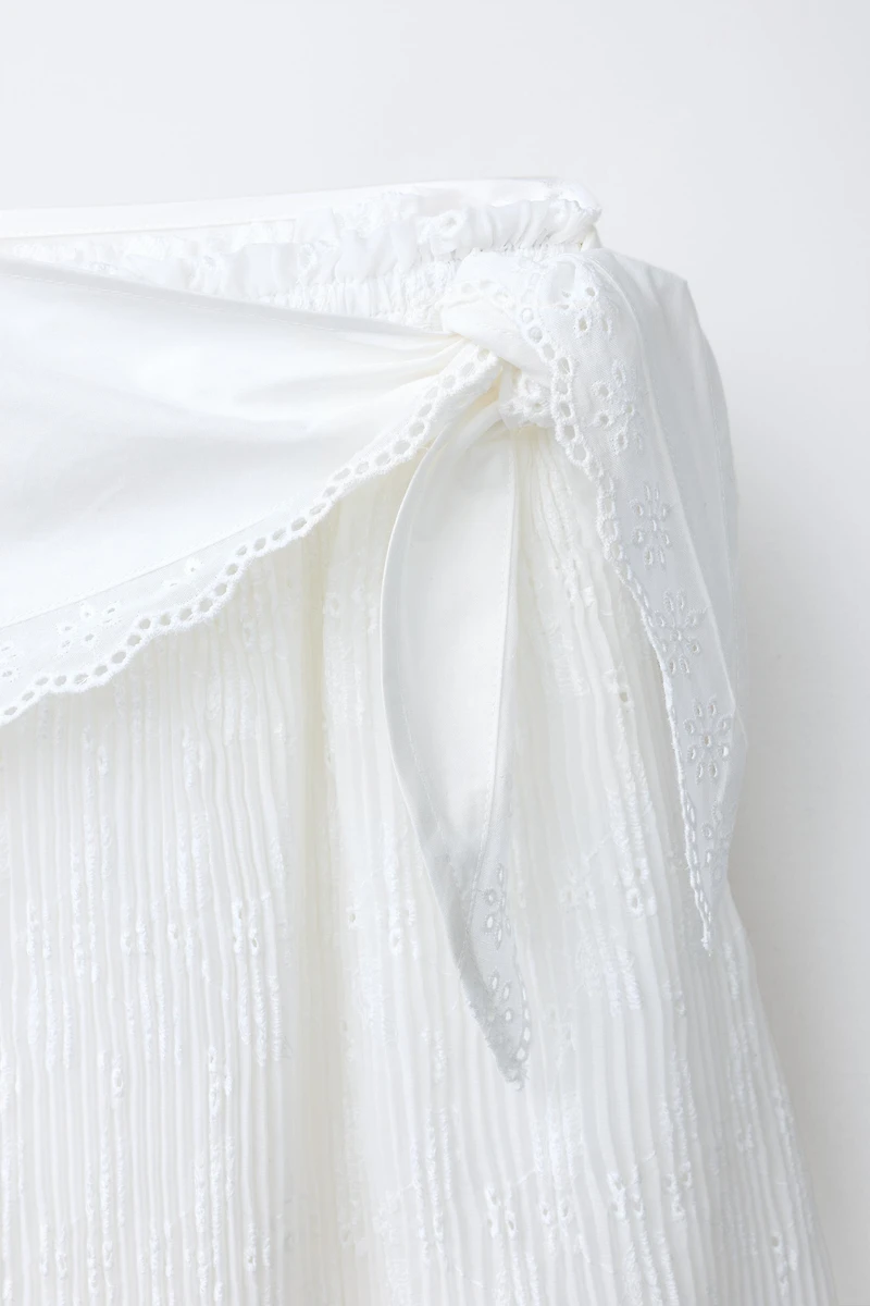 PLEATED MIDI SKIRT WITH SCARF DETAIL