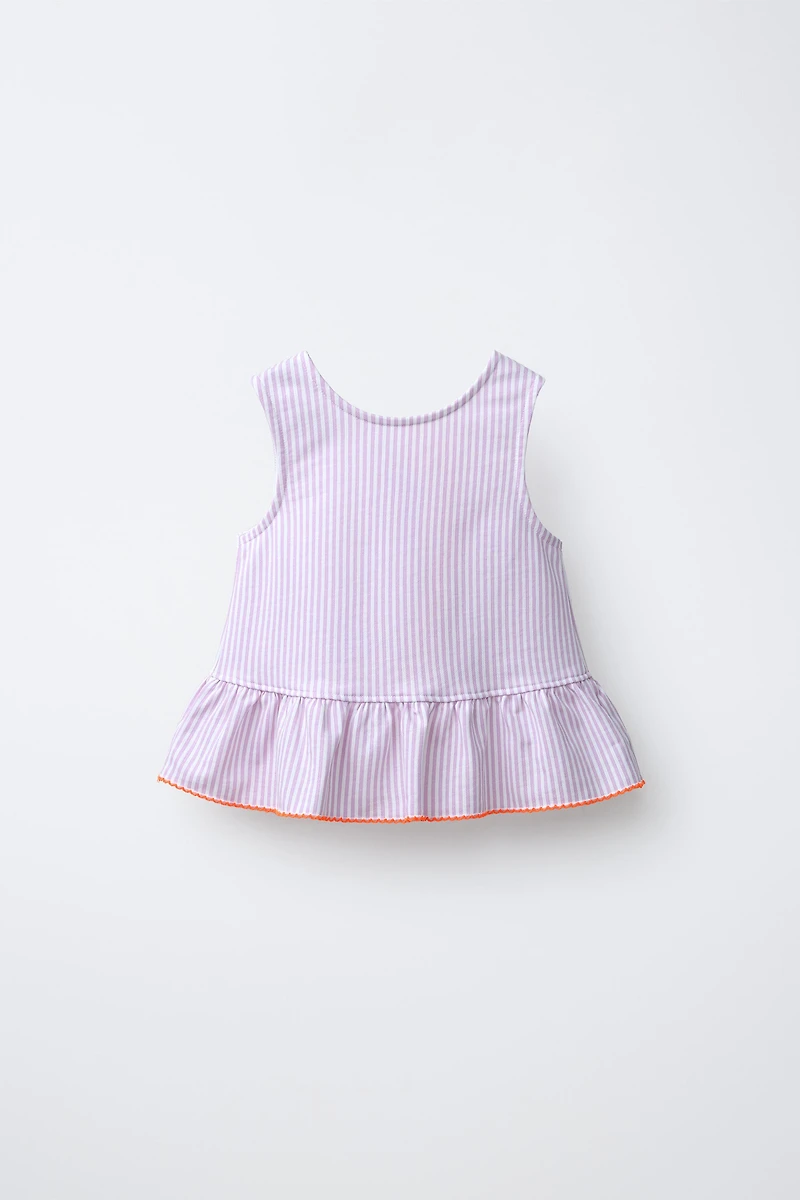 STRIPED PEPLUM TOP WITH CONTRAST LACE