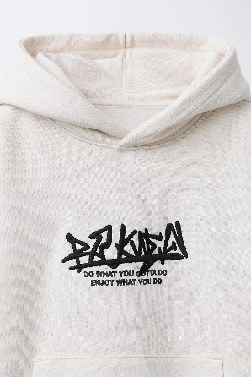 EMBROIDERED TEXT HOODIE