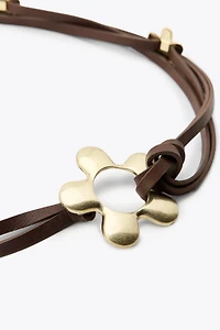 CEINTURE LACET EN CUIR FLEURS