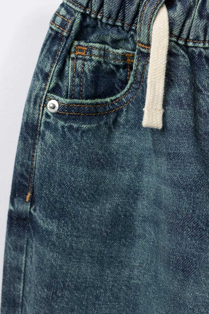 DISTRESSED BALLOON JEANS