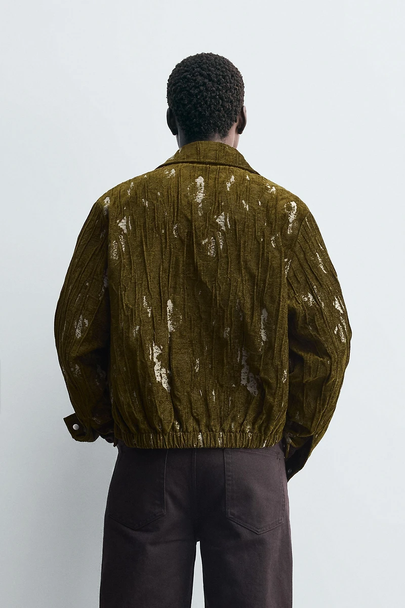 VESTE EN JACQUARD TEXTURÉ