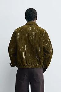 VESTE EN JACQUARD TEXTURÉ
