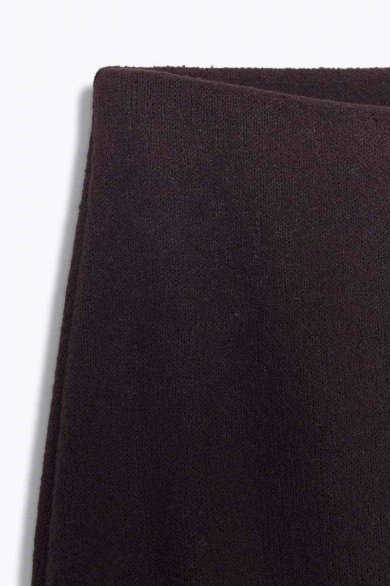 CUT-OUT KNIT MIDI SKIRT