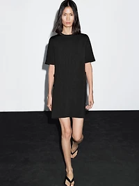Short knit dress with side button details