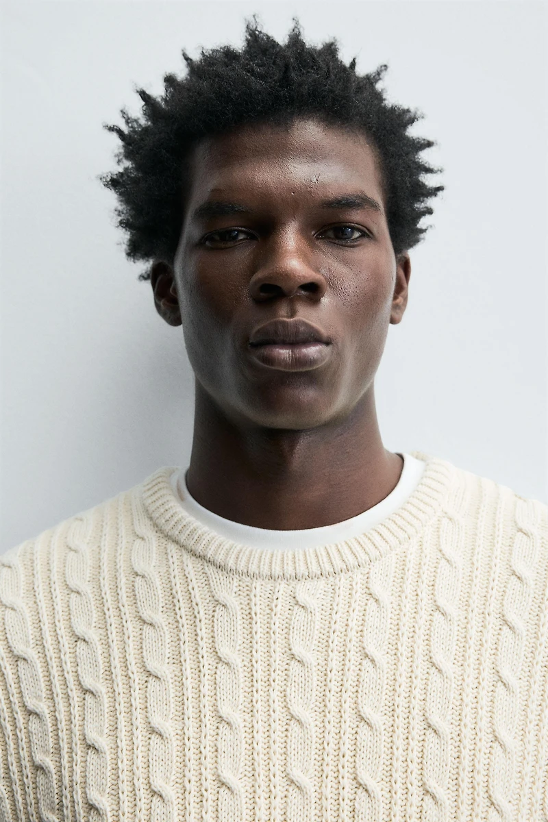 TEXTURED WOVEN SWEATER