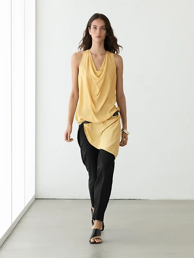 Long flowing asymmetric top