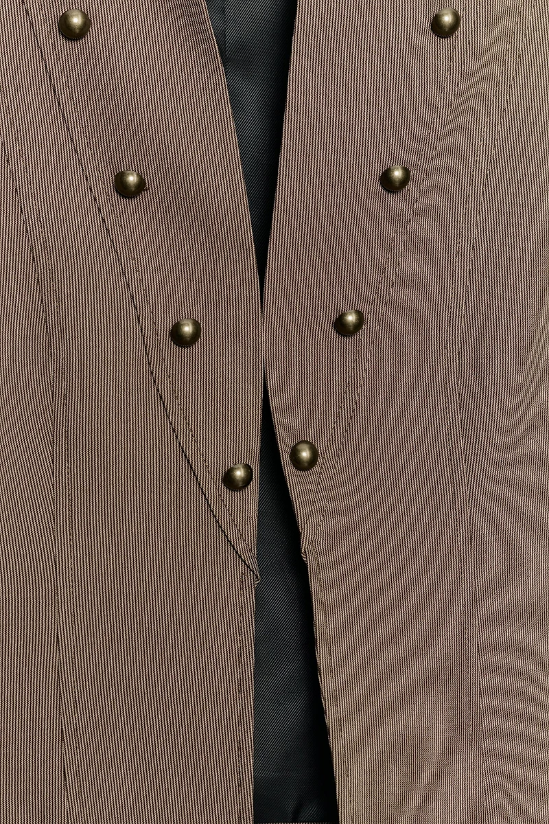 VESTE COURTE À BOUTONS