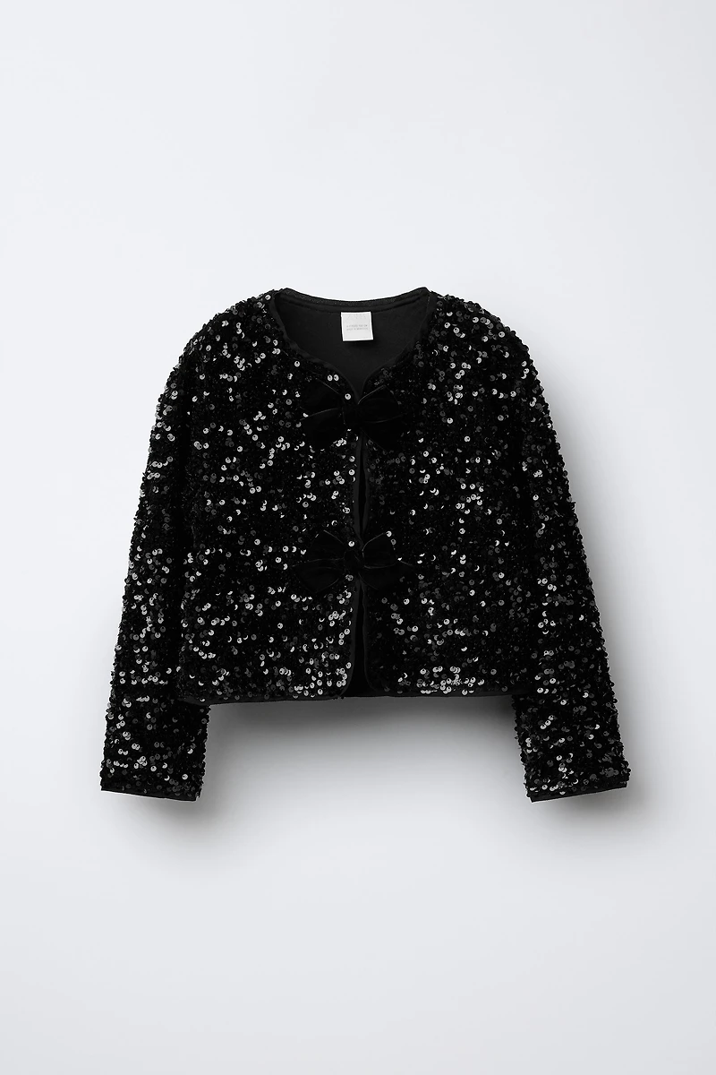 SEQUINED BOW BOLERO