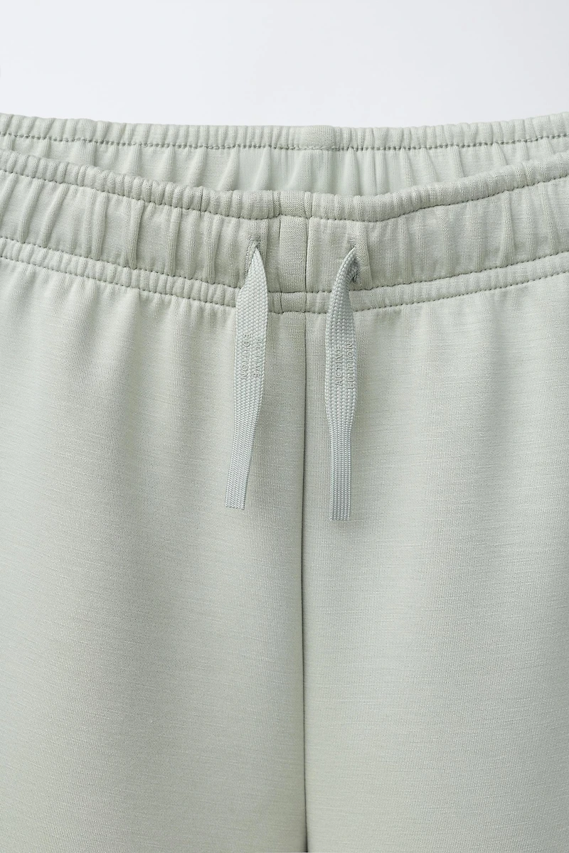 PIPED ATHLETIC SHORTS