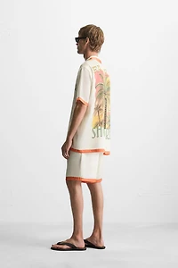 CHEMISE SATINÉE À BANDES CONTRASTÉES