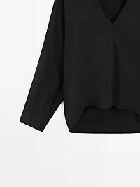Flowing blouse with V-neckline