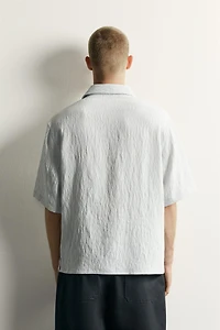 TEXTURED RELAXED FIT FLOWY SHIRT