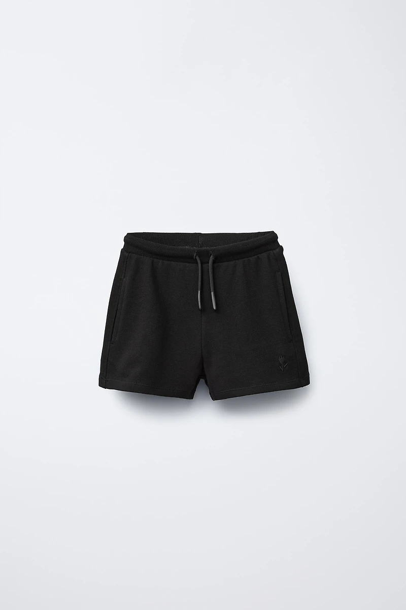 EMBROIDERED PLUSH SHORTS