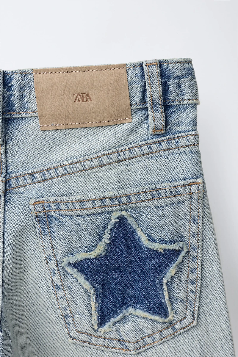 WIDE LEG STUDDED JEANS