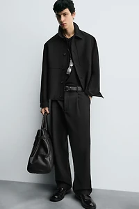 RELAXED FIT PLEATED PANTS