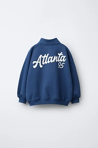 LETTER PATCH SWEATSHIRT